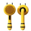 peine-masajeador-mascotas-acero-inoxidable-amarillo Cepillo Removedor de Pelo y Peine Masajeador para Perros y Gatos